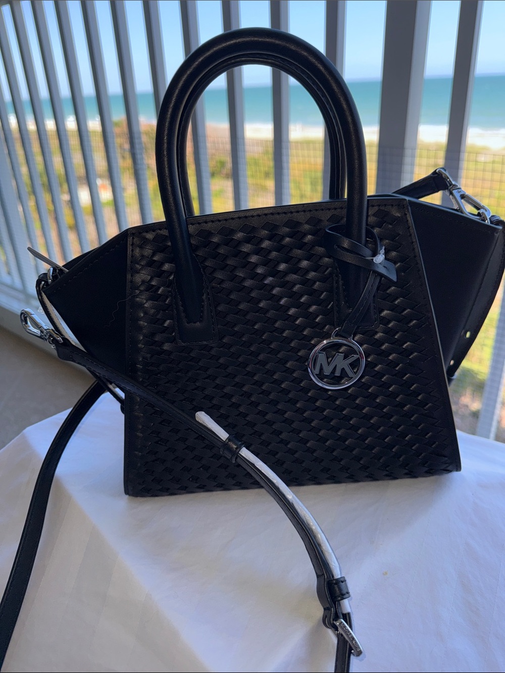 NWT - Michael Kors Black Woven Leather Satchel with MK Charm.